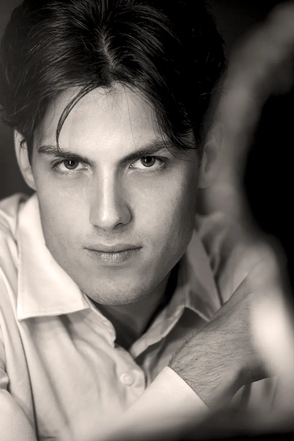 Primo piano ritratto uomo close-up book fotografico Milano